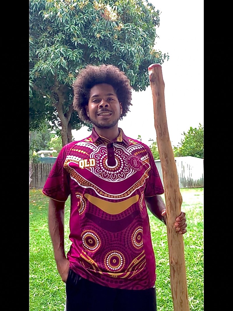 Main image: Luke Stevens holding a Didgeridoo (Supplied)